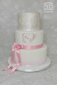 Pink ribbon, hand painted heart glitter and soft ombre three tier wedding cake Tamworth West Midlands Staffordshire