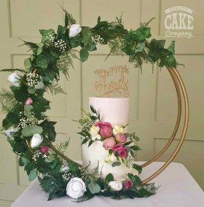 Pink two tier cake in hoop stand fresh flowers wedding cake Tamworth West Midlands Staffordshire