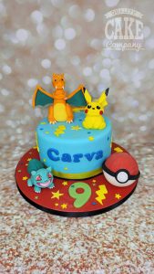 Pokemon charazard pickachu pokeball cake - Tamworth