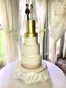 Pure gold large four tier white wedding cake Tamworth West Midlands Staffordshire