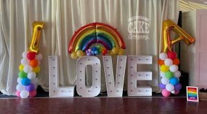 rainbow love columns wedding balloons - Tamworth