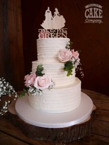 Ribbed buttercream wedding cake silk flowers personalised wooden topper Tamworth West Midlands Staffordshire