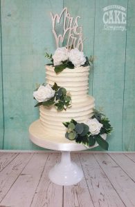 Ribbed buttercream two tier wedding silk flowers wodden topper Tamworth West Midlands Staffordshire