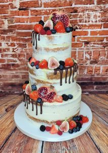 three tier semi naked wedding cake with fresh fruit - tamworth