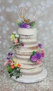 three tier semi nakes wild flower silk wedding cake - Tamworth