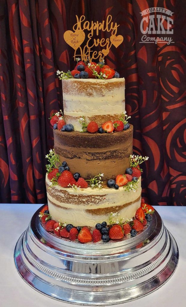 Semi-naked different flavour tiers with fruit three tier wedding cake Tamworth West Midlands Staffordshire