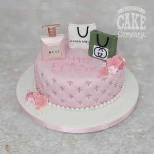 pink quilted cake with shopping bags and perfume - Tamworth