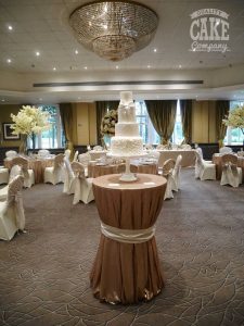 Showpiece cake classic white four tier on display Tamworth West Midlands Staffordshire