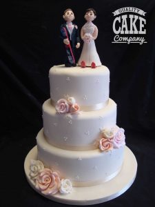 Skiing and snowboarding wedding cake topper people Tamworth West Midlands Staffordshire