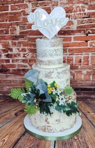 Small semi naked greens and golds and love topper wedding cake Tamworth West Midlands Staffordshire