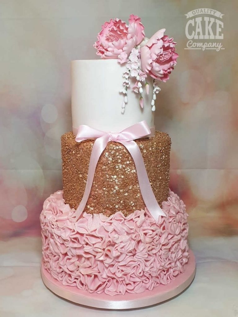 Pink ruffle rose gold sequins with pink sugar flowers three tier wedding cake Tamworth West Midlands Staffordshire