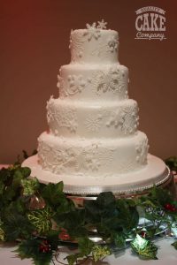 Snowflake white winter wedding four tier cake Tamworth West Midlands Staffordshire