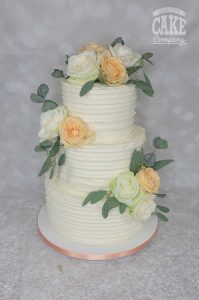 Three tier ribbed buttercream peach fresh roses wedding cake Tamworth West Midlands Staffordshire