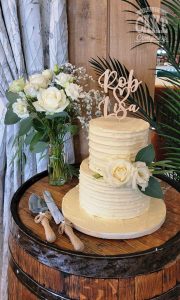 Two tier ribbed buttercream wedding simple fresh roses rustic Tamworth West Midlands Staffordshire