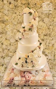 Wedding cake five tier sugar flower cascade white with rose gold touches floral stand Tamworth West Midlands Staffordshire