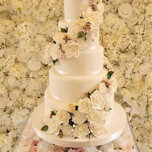 Wedding cake five tier sugar flower cascade white with rose gold touches floral stand Tamworth West Midlands Staffordshire