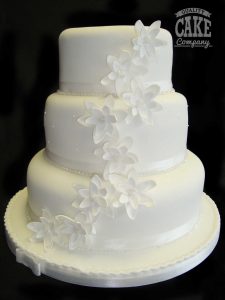 Pretty white wedding with contemporary flower cascade Tamworth West Midlands Staffordshire