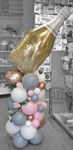 luxury champagne bottle balloon columns - Tamworth