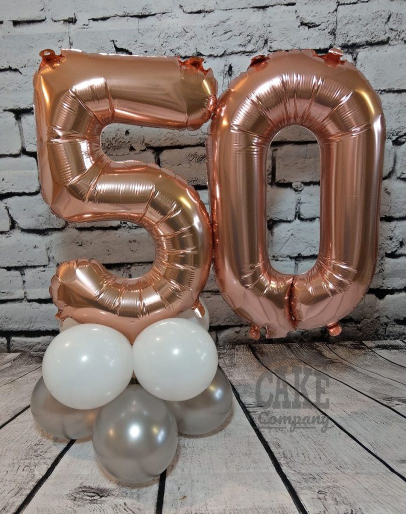 50th birthday balloons and cake