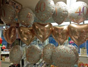 bunches of rose gold 40th birthday balloons - tamworth