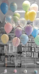 bunches of pastel latex happy birthday balloons - tamworth