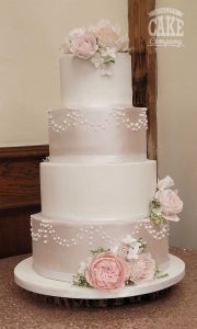 four tier pink white shimmer icing roses disney reveal front wedding cake Tamworth West Midlands Staffordshire