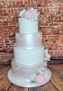 four tier pink white shimmer icing roses disney reveal soft wedding cake Tamworth West Midlands Staffordshire