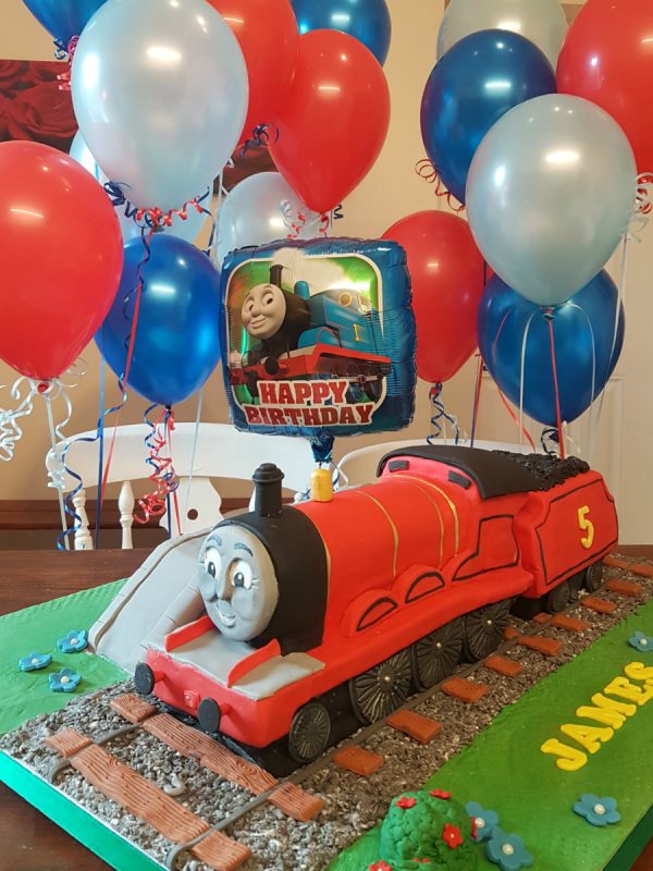 giant James from Thomas the Tank engine sculpted birthday cake and matching balloons - Tamworth