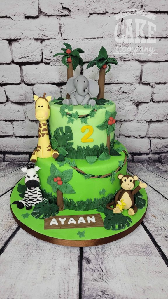 two tier jungle animals and trees birthday cake - Tamworth