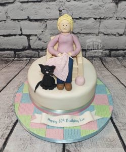 lady knitting with cat theme cake - Tamworth