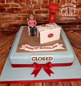 lady post office worker novelty birthday cake - tamworth