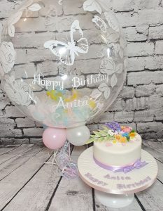 pastel floral cake with matching bubble balloon - Tamworth