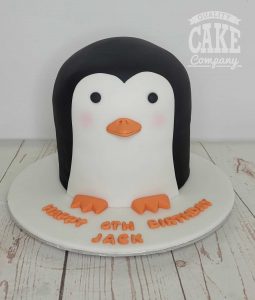 penguin head cut birthday cake - tamworth
