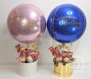 pink and blue balloon gifts hot air balloon sweets and cupcake - Tamworth