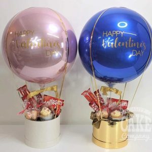 pink and blue balloon gifts hot air balloon sweets and cupcake - Tamworth
