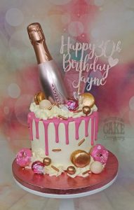 pink and rose gold drip cake - tamworth