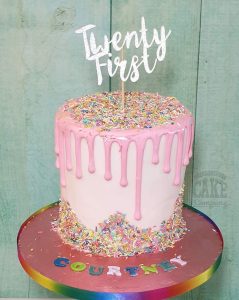 tall pink rainbow sprinkles drip cake - tamworth