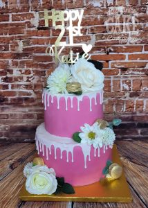two tier bright pink floral drip cake - Tamworth