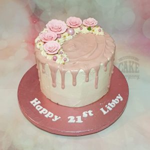 pink modern drip cake with flowers - tamworth