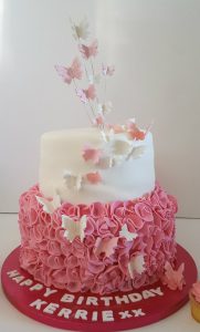 two tier pink ruffle and butterflies cake - Tamworth