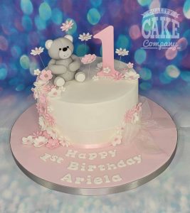 pretty floral cake with grey teddy bear first birthday cake - Tamworth