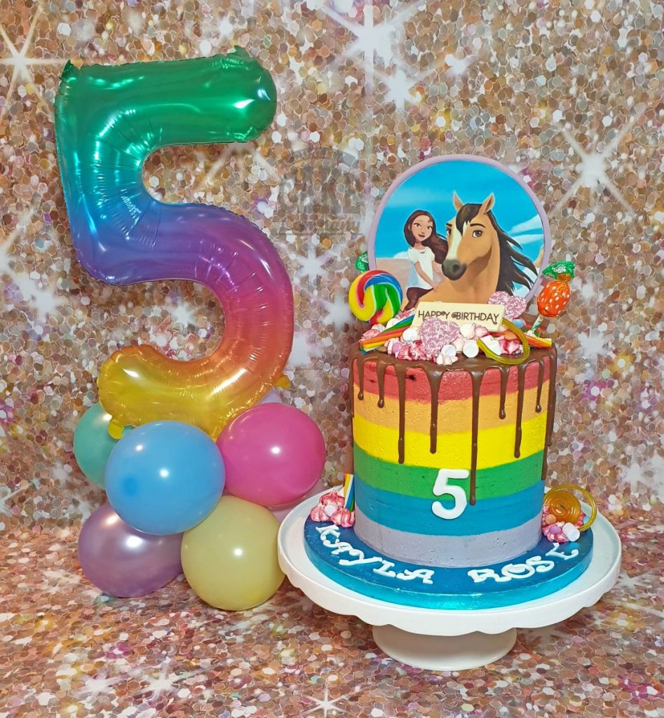 rainbow bright drip cake and matching balloon - Tamworth