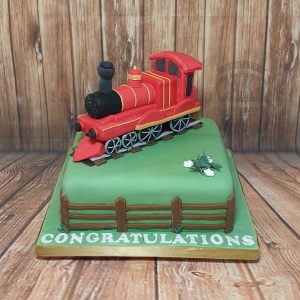 red train model on cake - tamworth