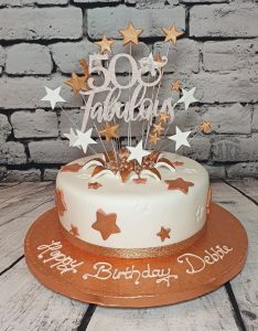 rose gold 50th birthday star burst cake - Tamworth