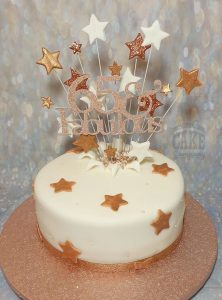 rose gold 65th birthday star burst cake - Tamworth