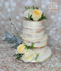 semi naked wedding cake white and yellow fresh flowers two tier Tamworth West Midlands Staffordshire