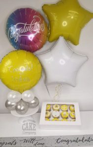 yellow and white congratulations cupcakes and balloons - tamworth
