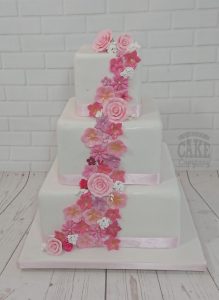 three tier square pink floral cascade cake - Tamworth