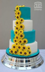 sunflower cascade teal and white four tier wedding cake Tamworth West Midlands Staffordshire