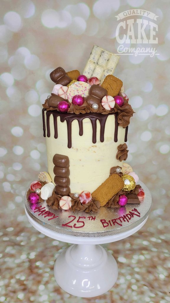 tall chocolate drip cake with touch of pink - Tamworth